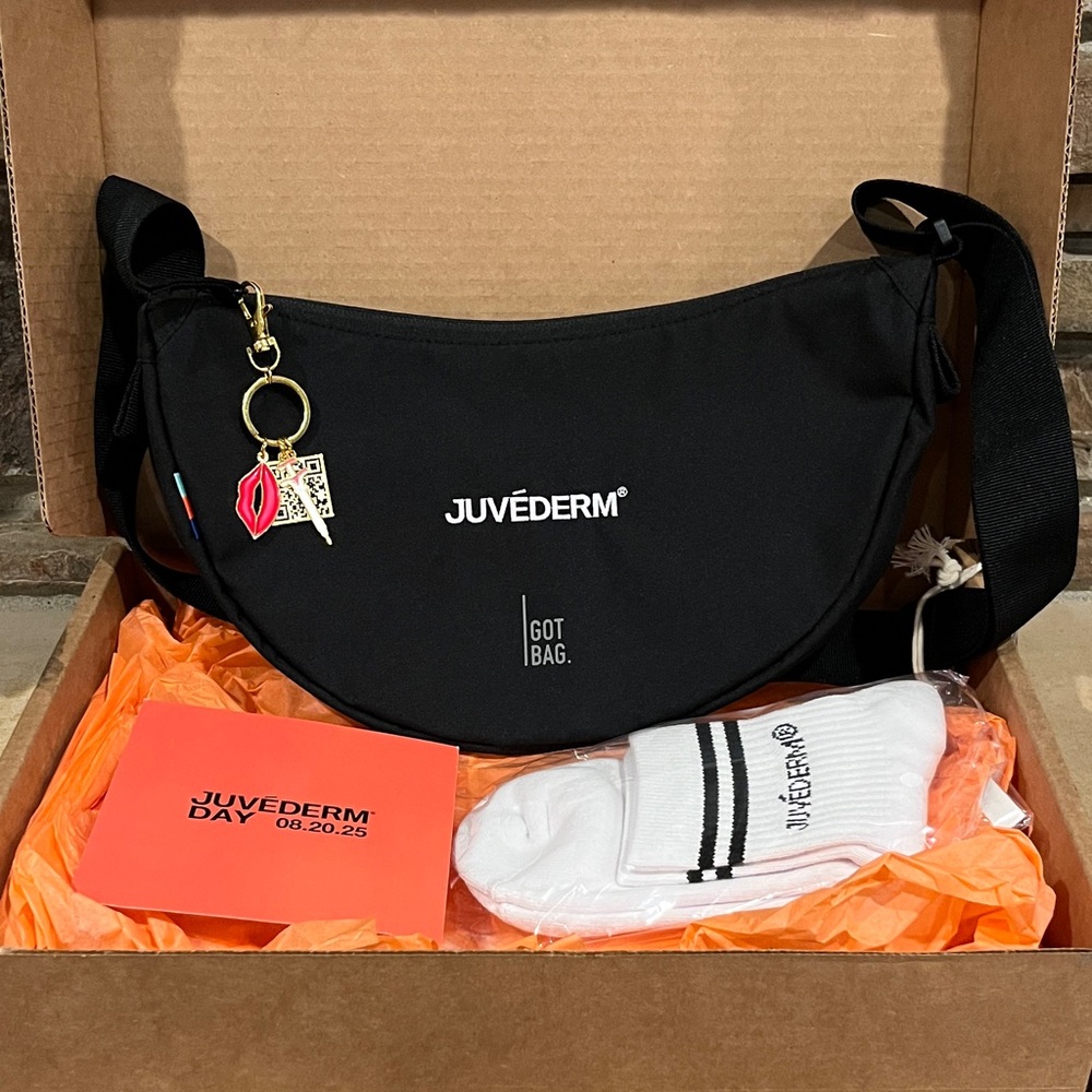 Juvéderm Day 2025 Swag Box Black Crossbody Moon Bag with Charms and Socks